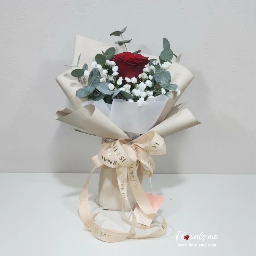 ช่อดอกไม้กุหลาบแดง 1 ดอก ห่อกระดาษสีครีม